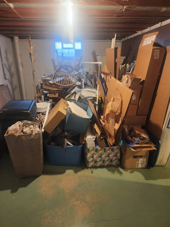 Roll-off dumpster container at job site for Yard Waste Dumpster Rental in Mayfield